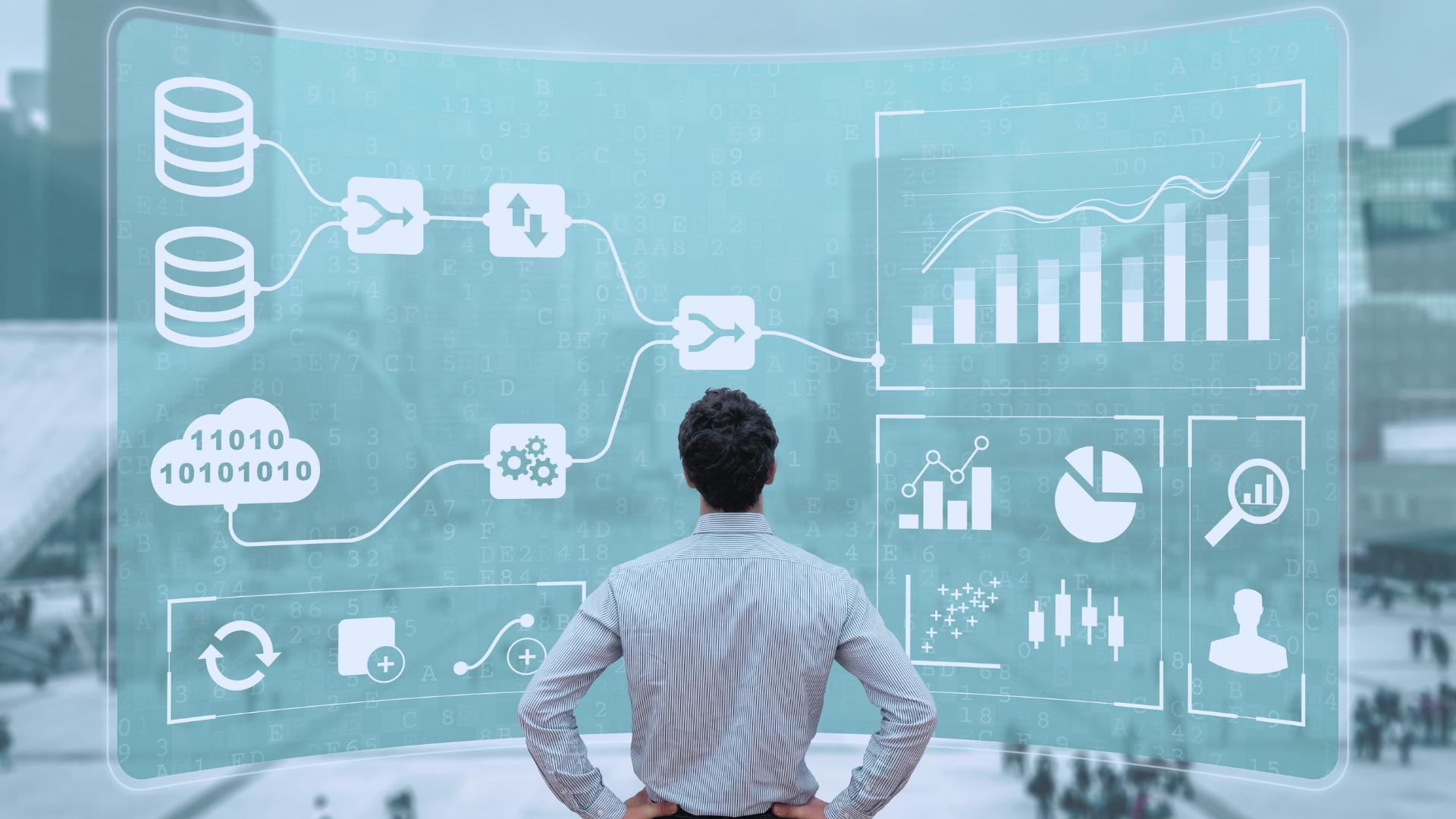 A depiction of a man standing in front of a building management system screen